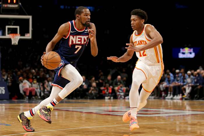 Brooklyn Nets forward Kevin Durant (7) drives to the basket against Atlanta Hawks forward De'Andre Hunter (12) during the third quarter at Barclays Center.